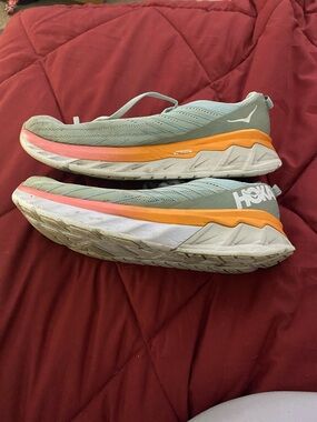 Hoka Seafoam Green Running Shoes with Orange and Coral Accents